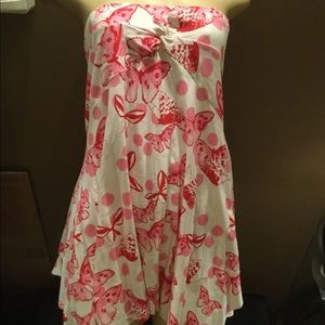 Shirt size medium or can be worn as a dress